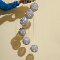 Lampadario a sei sfere regolabili in altezza