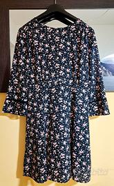 Abito lunghezza media, maniche lunghe, con fondo n