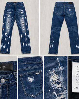 Jeans AMIRI distressed con schizzi di vernice