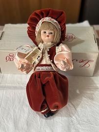 Bambola in porcellana Made in Italy rossa “Jago”