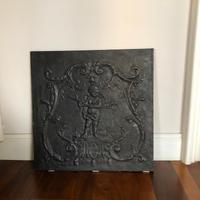 Antica piastra da camino in ghisa neoclassica
