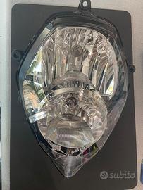 FANALE ANTERIORE CPL. SUZUKI V-STROM.  35100-31J01