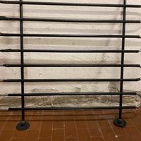 Griglia divisoria regolabile