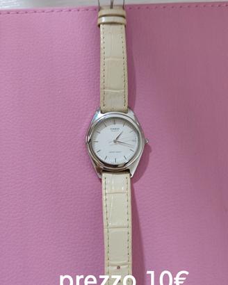 orologio e anelli e bracciale 