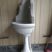 Fontana da giardino ad angolo in pietra