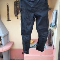 Pantaloni antivento/antipioggia con ginocchiere 
