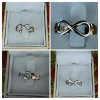 Anello infinito in argento 950 e oro 18 carati