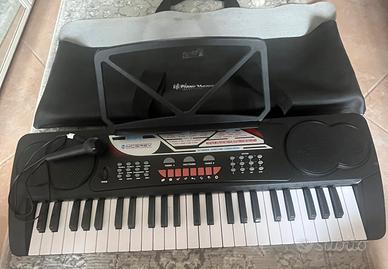 Tastiera come nuova + microfono incluso!