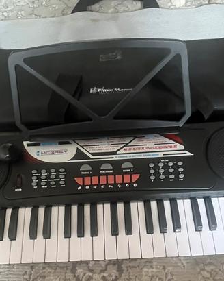 Tastiera come nuova + microfono incluso!