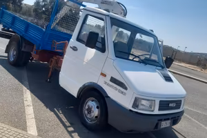 Iveco daily  ribaltabile  con gru