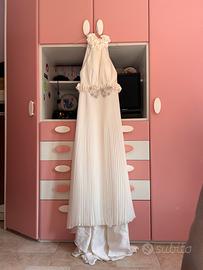 Vestito da sposa bianco con strascico