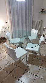 tavolo cristallo ovale 180 x 110 e sedie in pelle