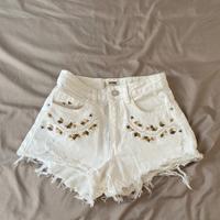 pantaloncino bianco con dettagli