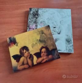 coppia di quadretti angeli Raffaello putti pietra