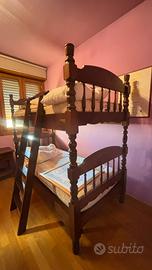 Camera da letto doppia in legno massiccio