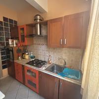 Armadio, contro mobile cucina e frigorifero