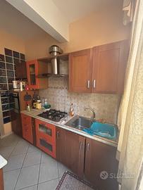 Armadio, contro mobile cucina e frigorifero