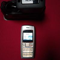 Nokia 1600 con caricatore e cuffiette originali