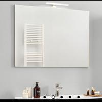 Specchio nuovo ancora imballato con lampada LED