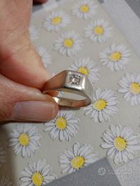 anello con brillante 