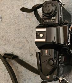 Fotocamera Minolta X-300s con obiettivo 