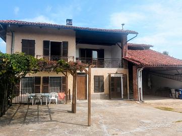 casa con 2 appartamenti 