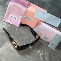 Miu Miu SMU11W Black: Glamour Iconico