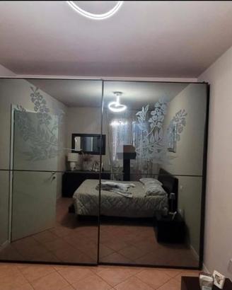 armadio con ante scorrevoli 