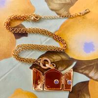 Collana medaglione apribile farfalla color oro