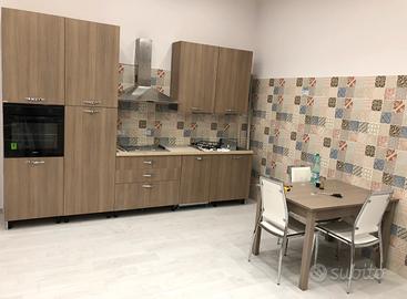 Bilocale con posto auto e utenze