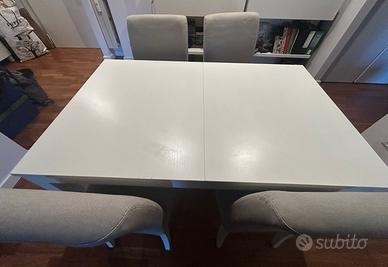 Tavolo bianco allungabile con sedie