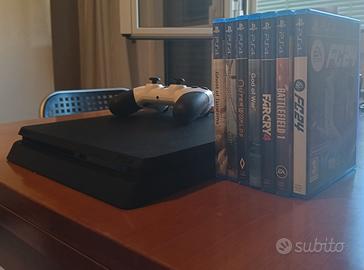 PlayStation 4 slim + joystick + bundle giochi 