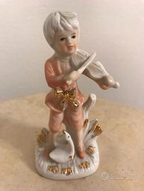statuetta porcellana fanciullo e il violino