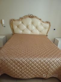 Letto con testa in pelle
