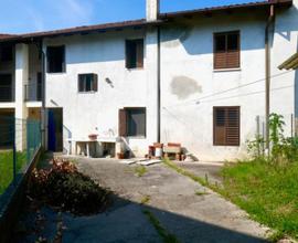 Casa in linea bicamere con giardino