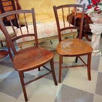 Coppia di sedie stile Thonet austriache intagliate