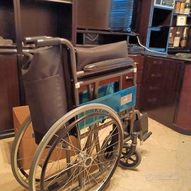 sedia a rotelle pieghavole