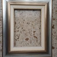 Cornice in oro e argento