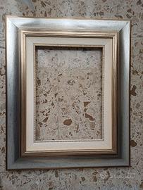 Cornice in oro e argento