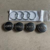 Scritta Audi e coprimozzi