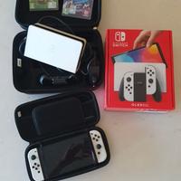 NINTENDO SWITCH OLED, Bianco + Custodie + 2 giochi