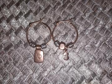 Orecchini cerchi Dodo Pomellato oro rosa