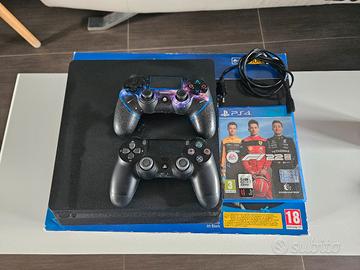 playstation 4 slim + 2 joystick + 2 giochi
