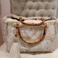 Borsa artigianale in tessuto damascato 