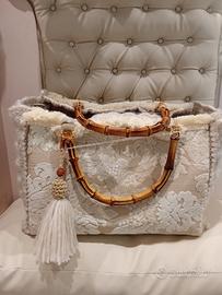 Borsa artigianale in tessuto damascato 