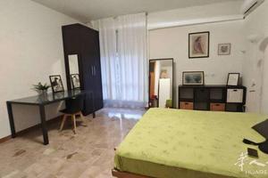 Ampia stanza METRO BIGNAMI sotto casa