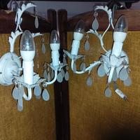 coppia di applique bianche con lampadine
