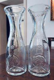 Coppia di caraffe vintage in vetro