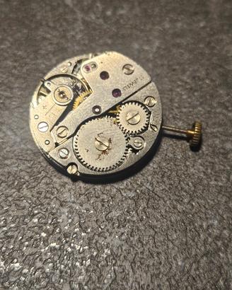 Meccanismo automatico con corona Omega