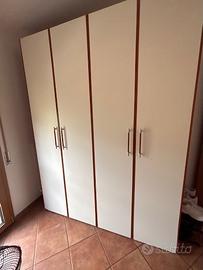 Camera da letto singola con armadio e scrivania
